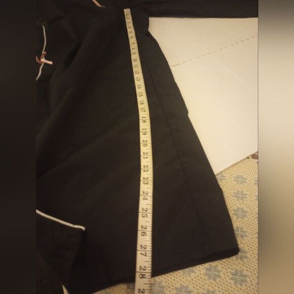 Elastic waist track style pants with pink bows accents on the sides - Picture 5 of 7